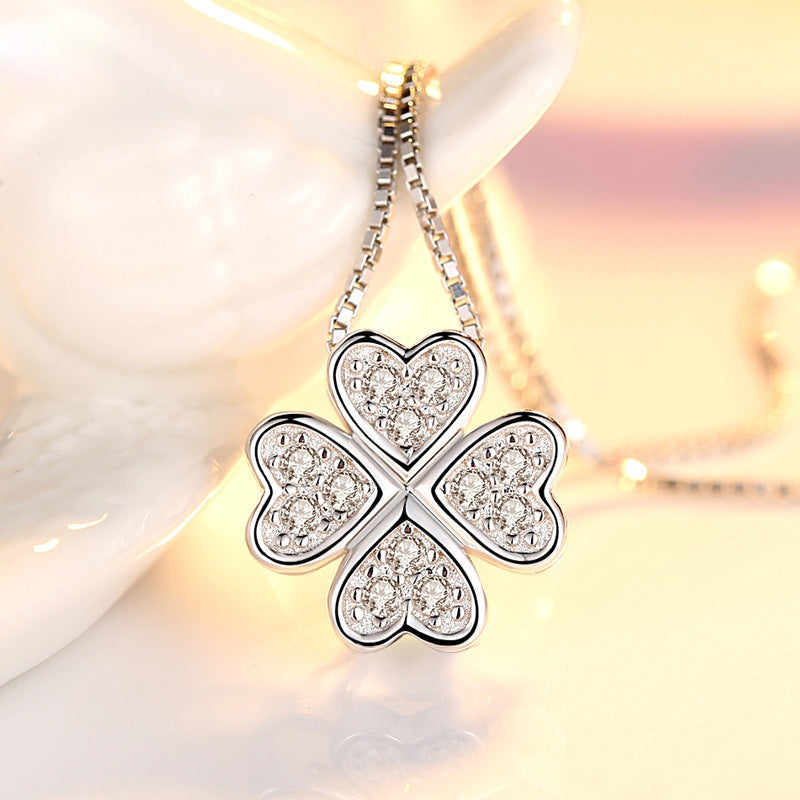 Damen Halskette mit herzförmigem Glücksanhänger und funkelnden Zirkonia Shop Nory