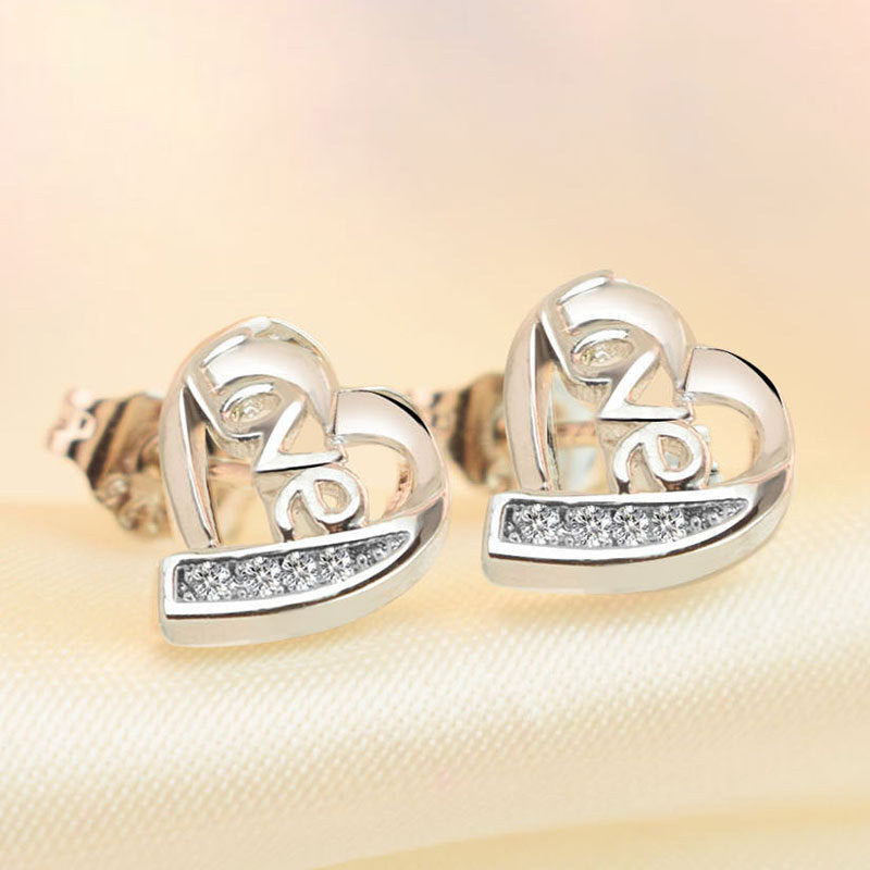 Damen Ohrringe mit herzförmigem Design und funkensprühendem Zirkonia-Besatz Shop Nory