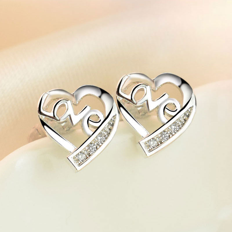 Damen Ohrringe mit herzförmigem Design und funkensprühendem Zirkonia-Besatz Shop Nory