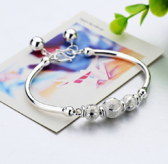 Damen Armreif mit funkelndem Kristallbesatz und modernem Design Shop Nory