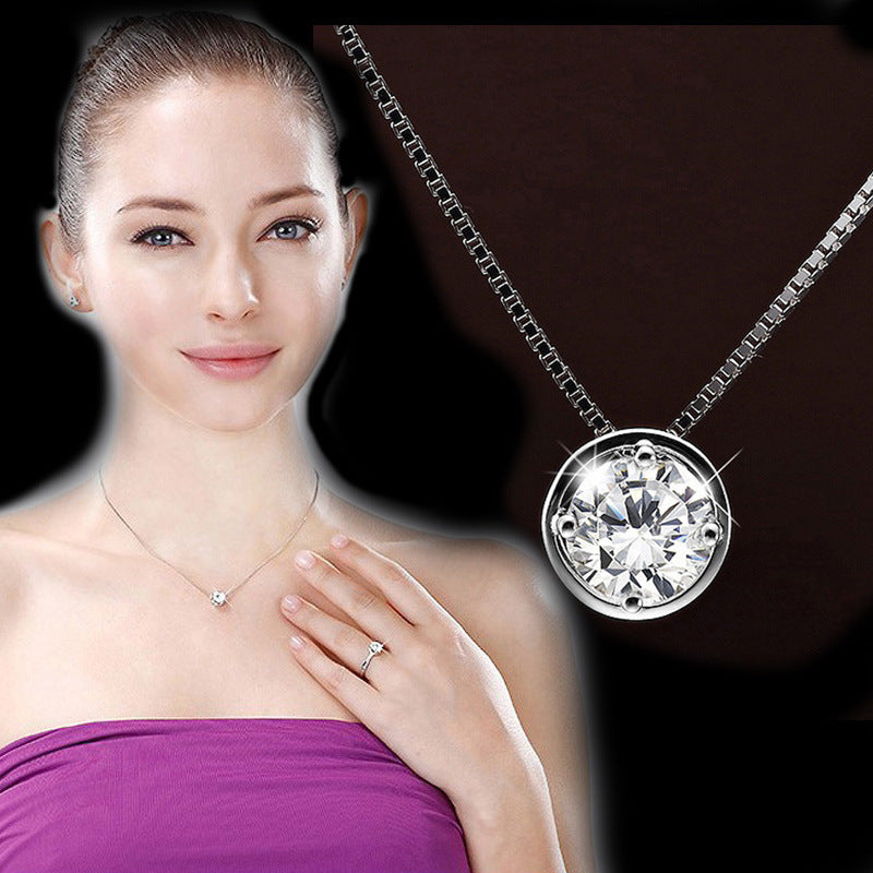 Damen Halskette mit funkelndem Zirkonia-Anhänger und eleganter Fassung Shop Nory