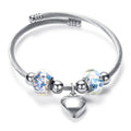 Damen Armband mit zeitlosen Glaskugeln und Herzanhänger Shop Nory