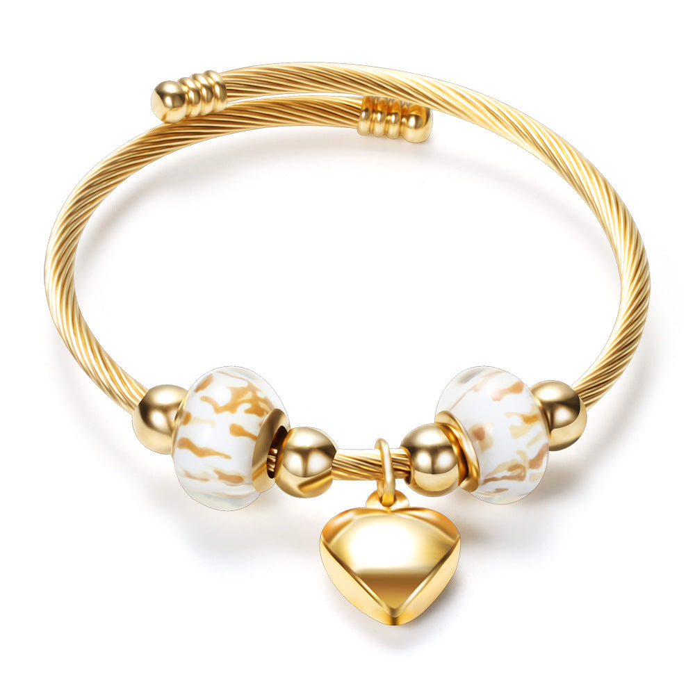 Damen Armband mit zeitlosen Glaskugeln und Herzanhänger Shop Nory