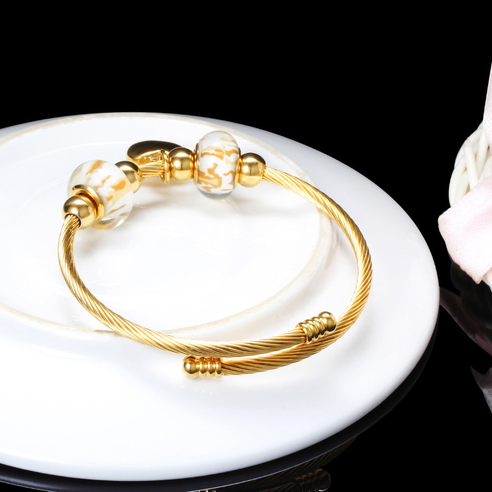 Damen Armband mit zeitlosen Glaskugeln und Herzanhänger Shop Nory