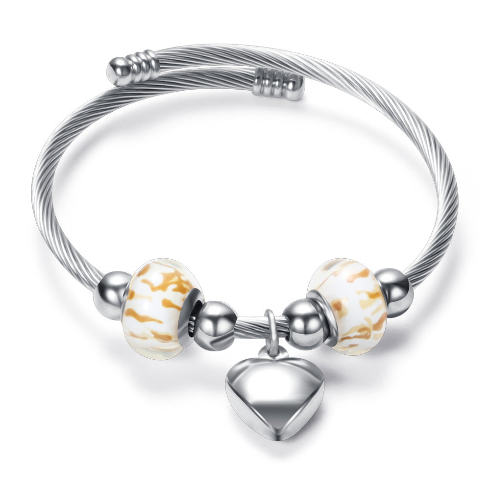 Damen Armband mit zeitlosen Glaskugeln und Herzanhänger Shop Nory
