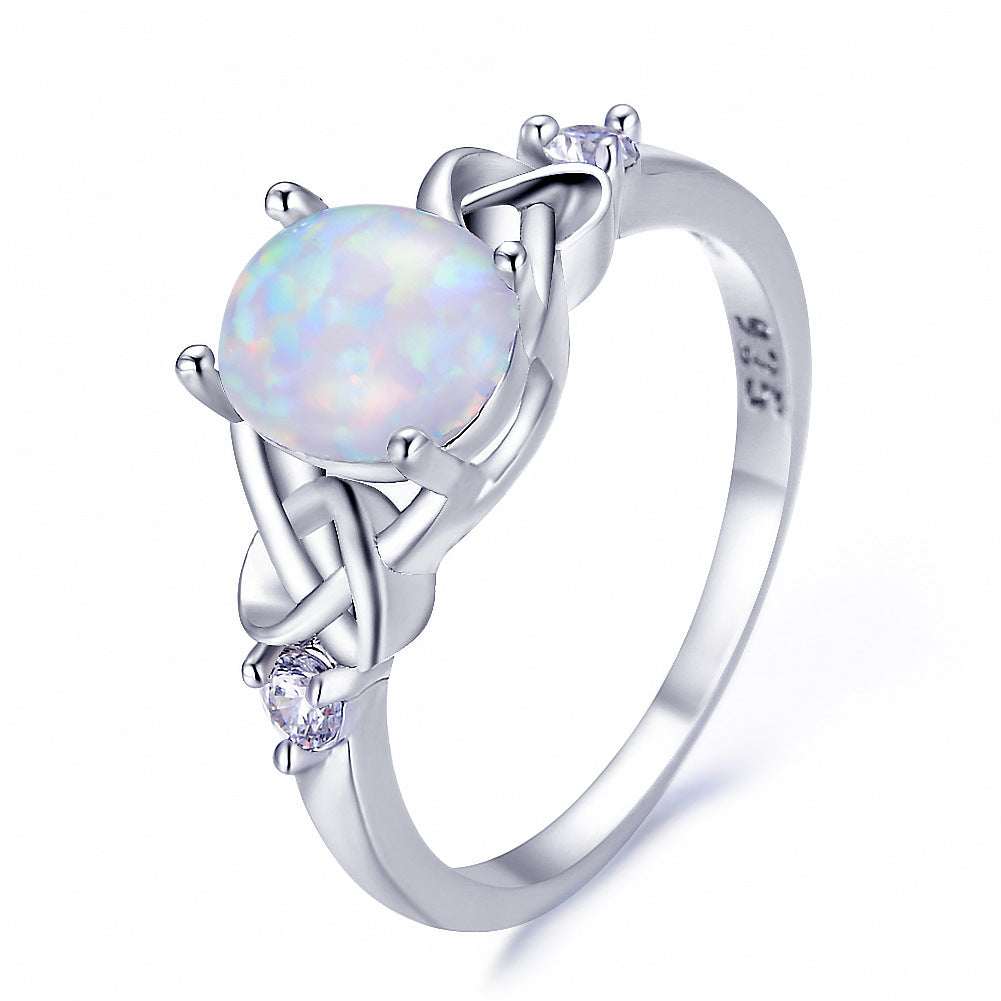 Damen Ring mit funkelndem Opalschmuck und kunstvollen Zirkonia-Details Shop Nory