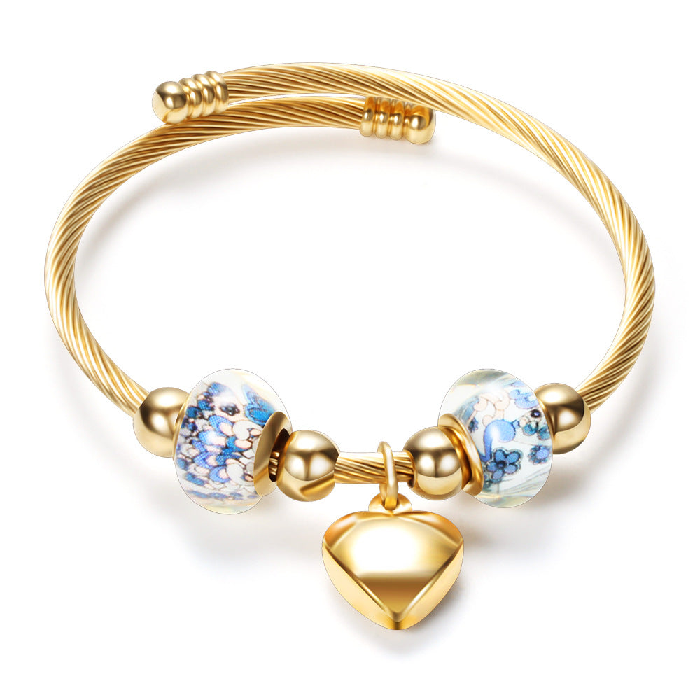 Damen Armband mit zeitlosen Glaskugeln und Herzanhänger Shop Nory