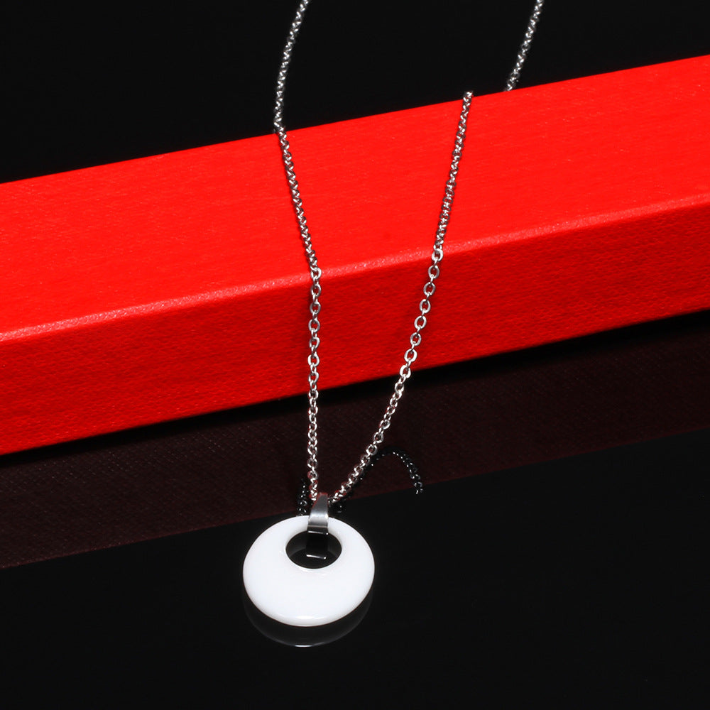 Damen Halskette mit modernem pendelartigen Anhänger und hochwertiger Edelstahlkette Shop Nory