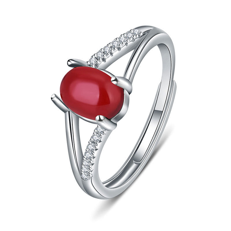 Damen eleganter Ring mit rotem Edelstein und funkelnden Zirkonia Shop Nory
