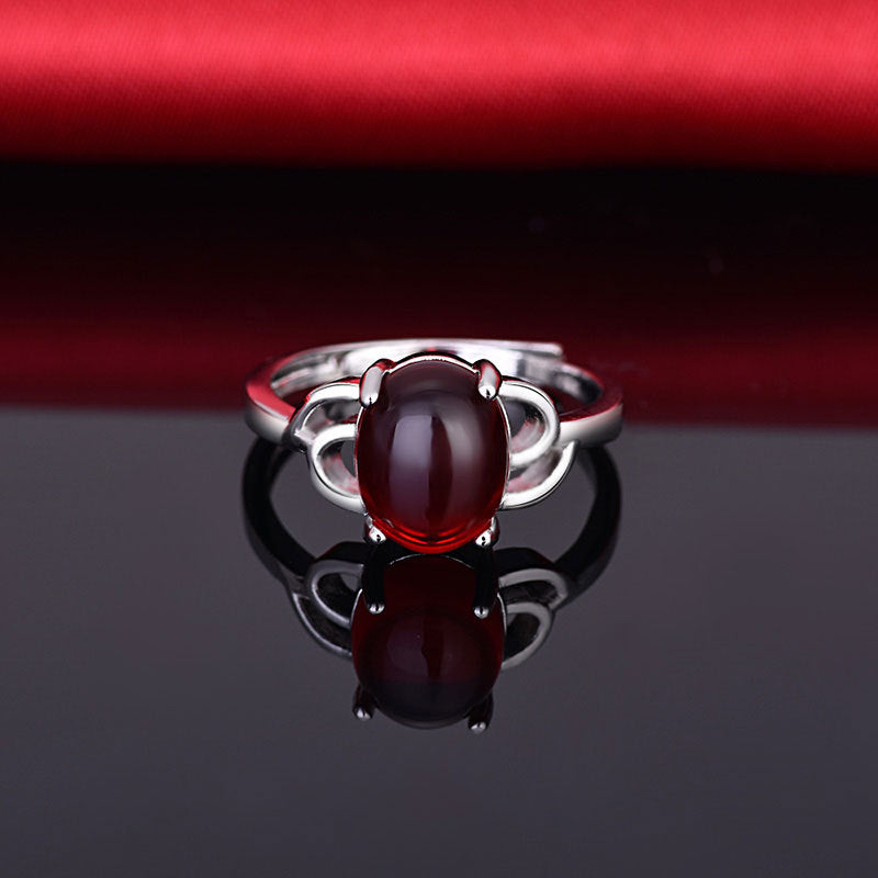Damenring mit rotem Edelstein und filigranem Design Shop Nory