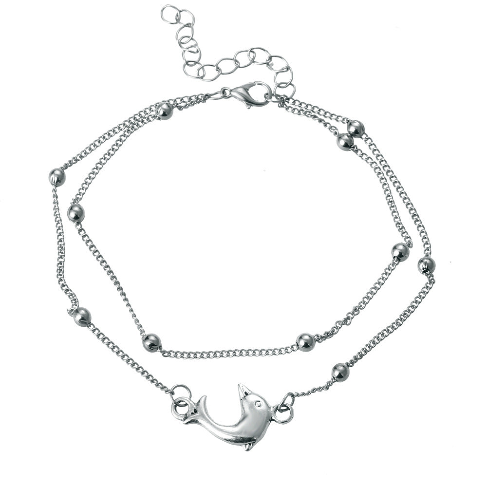 Damenarmband mit verspieltem Delphin-Anhänger Shop Nory