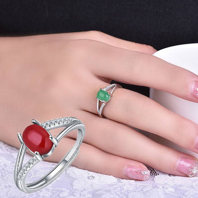 Damen eleganter Ring mit rotem Edelstein und funkelnden Zirkonia Shop Nory