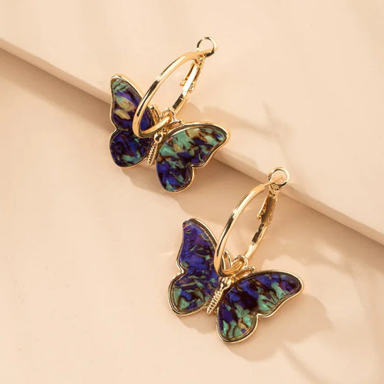 Vergoldete Schmetterlingsohrringe mit Acrylkristallen – Mariposa | Shop Nory