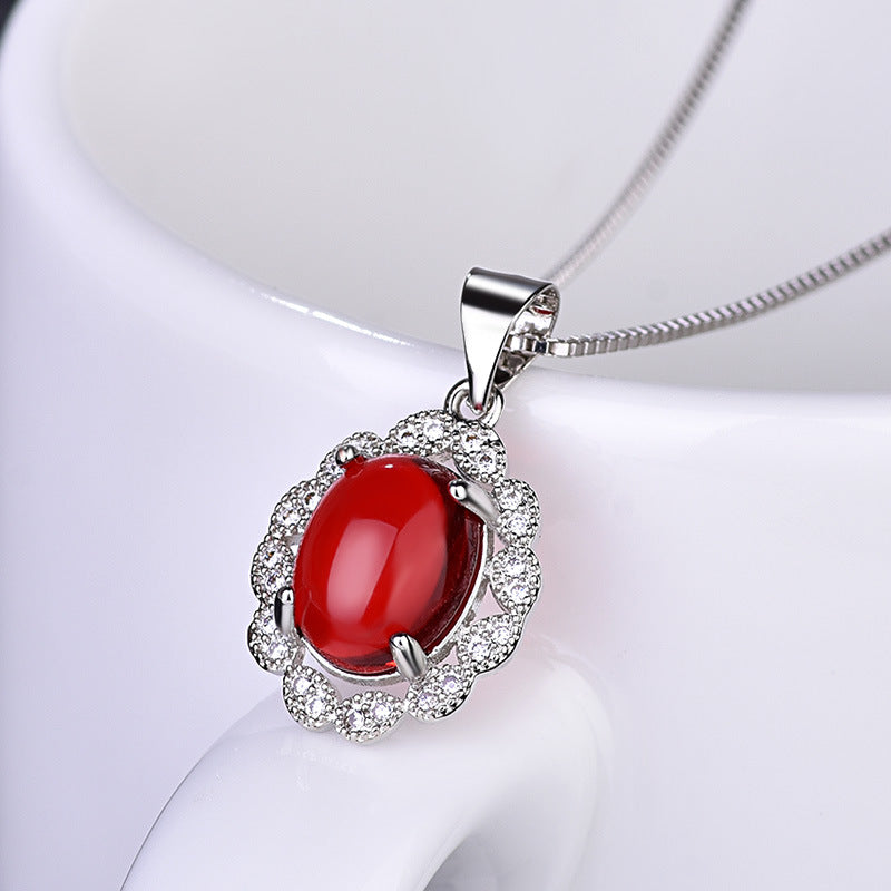 Damen Halskette mit rotem Edelstein und funkelnden Zirkonia Shop Nory