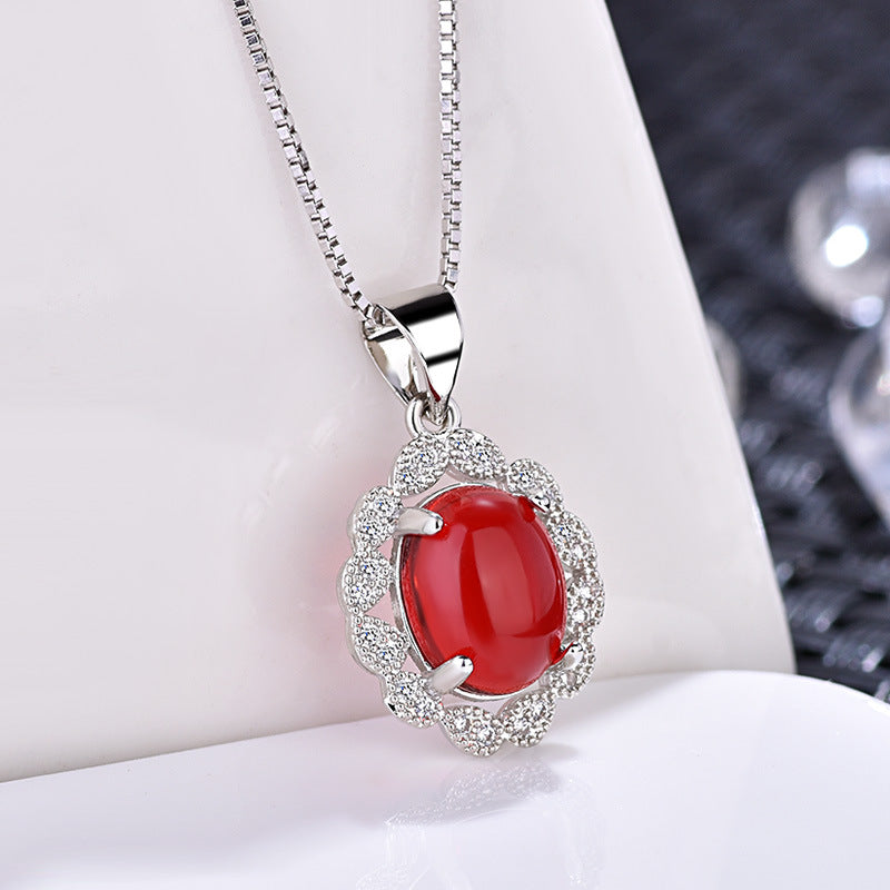 Damen Halskette mit rotem Edelstein und funkelnden Zirkonia Shop Nory