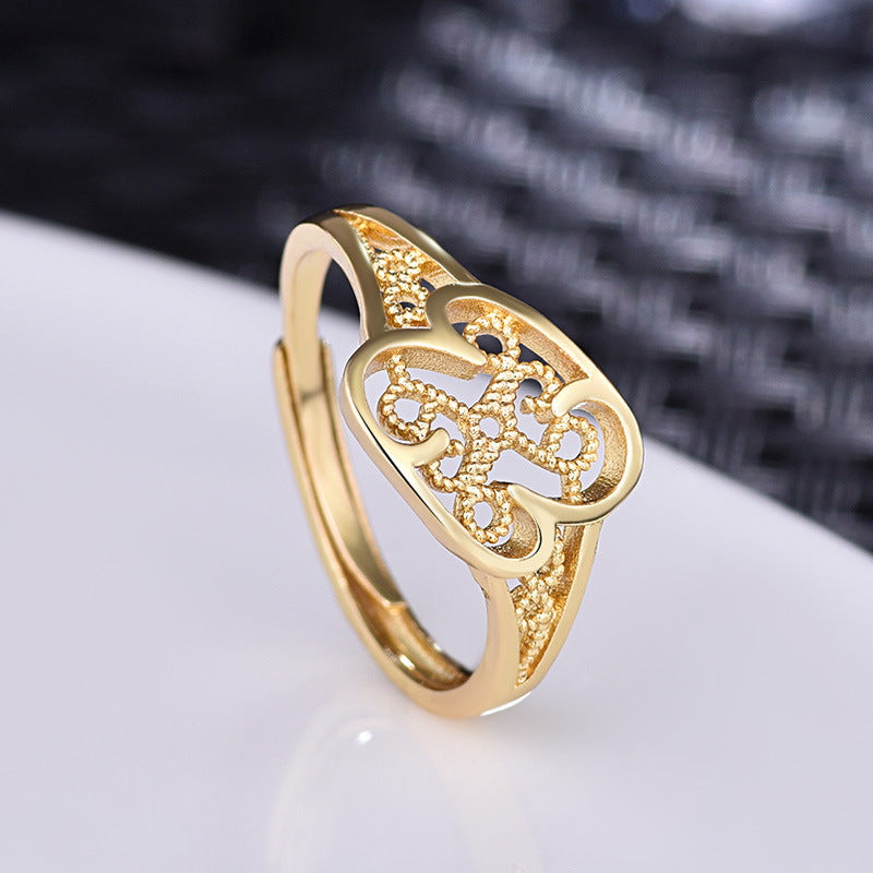 Damenring mit kunstvollem Muster und hochwertiger Goldbeschichtung Shop Nory