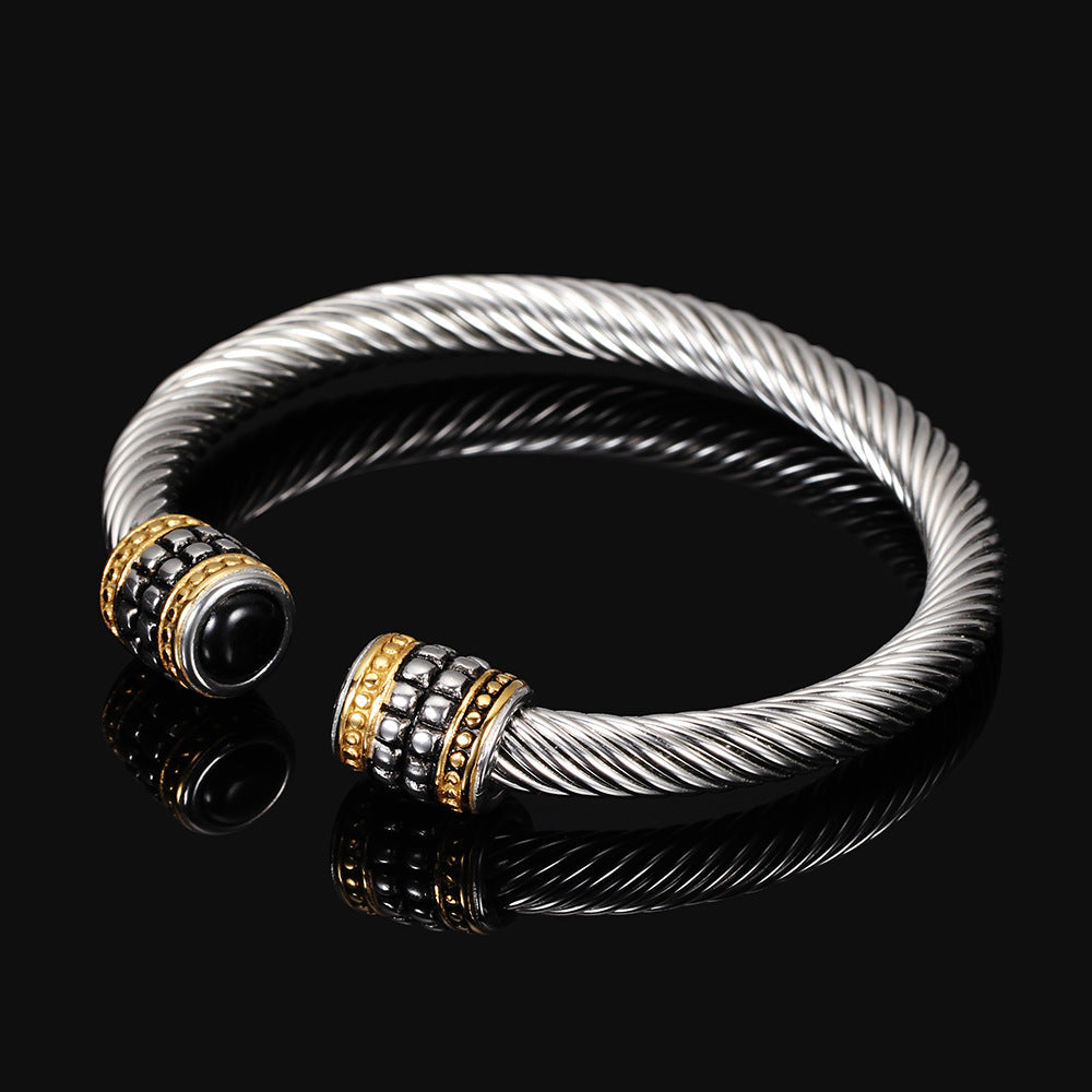 Damen Armreif mit drehbarem Drahtdesign und eleganten Zirkonia-Details Shop Nory