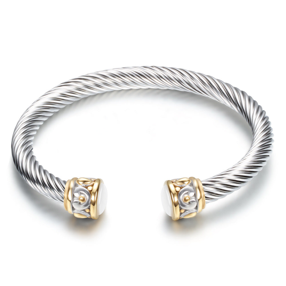 Damen Armreif mit drehbarem Drahtdesign und eleganten Zirkonia-Details Shop Nory