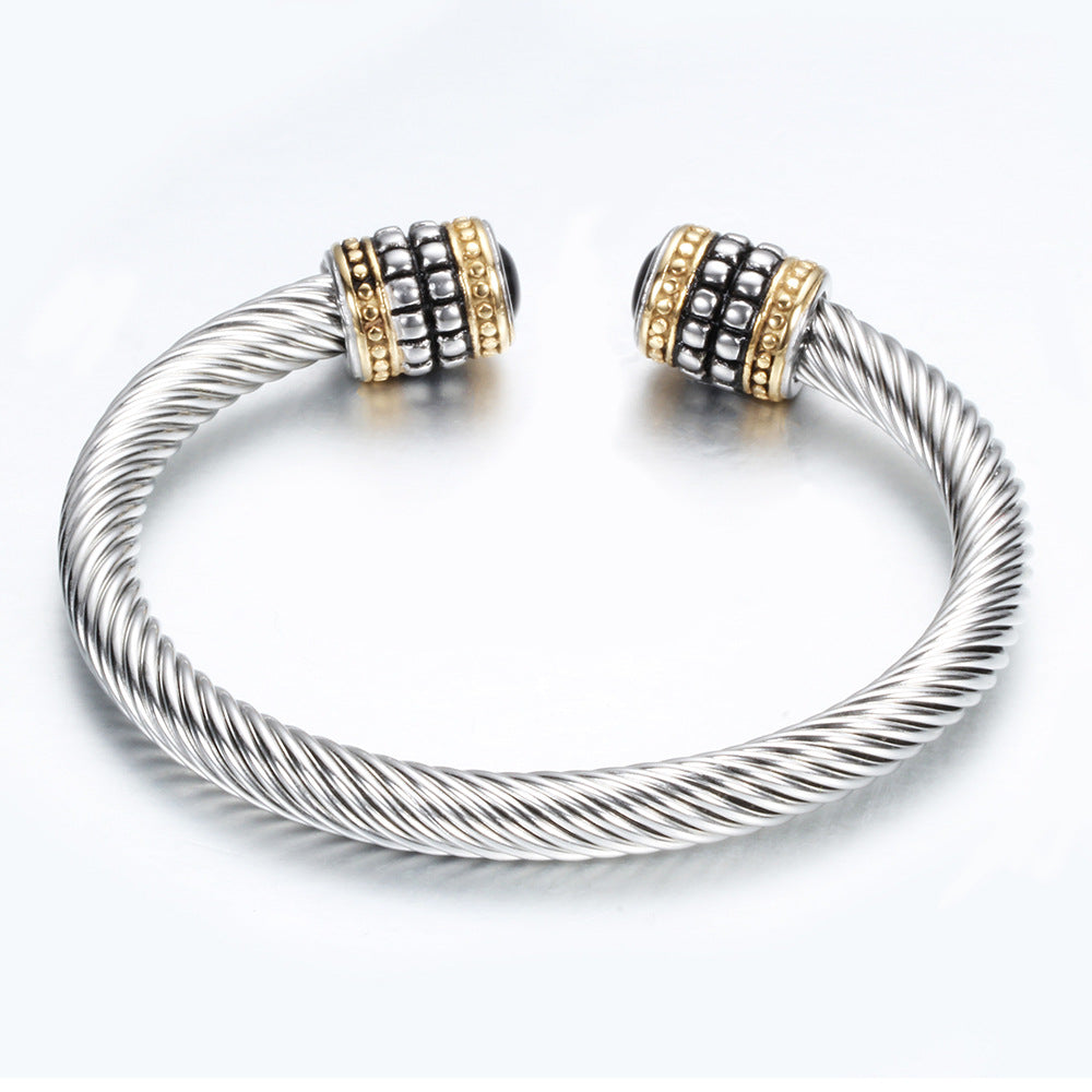 Damen Armreif mit drehbarem Drahtdesign und eleganten Zirkonia-Details Shop Nory