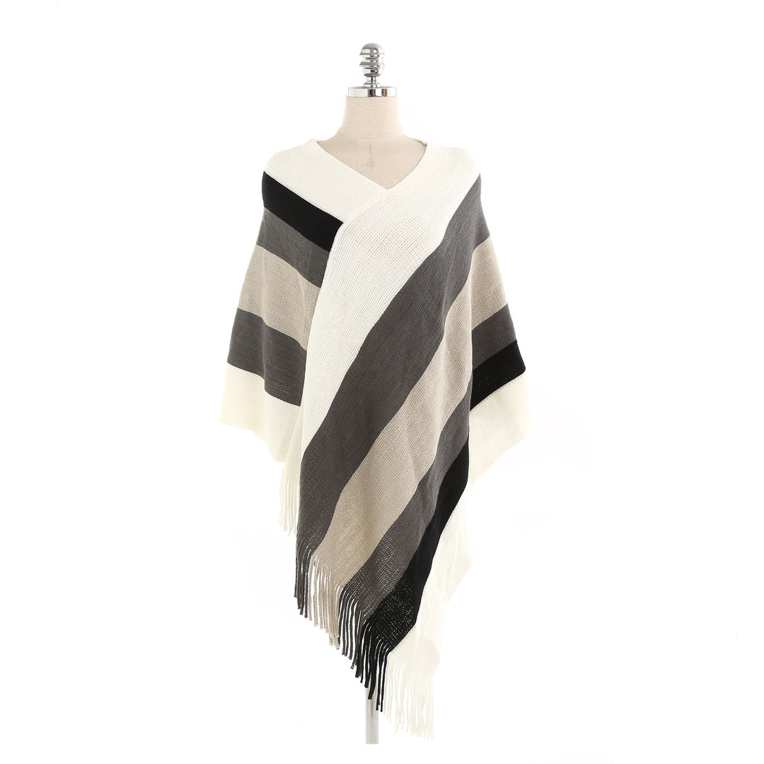 Damen Oversize‑Strickruana mit Fransensaum und diagonaler Blockstreifen‑Optik Shop Nory