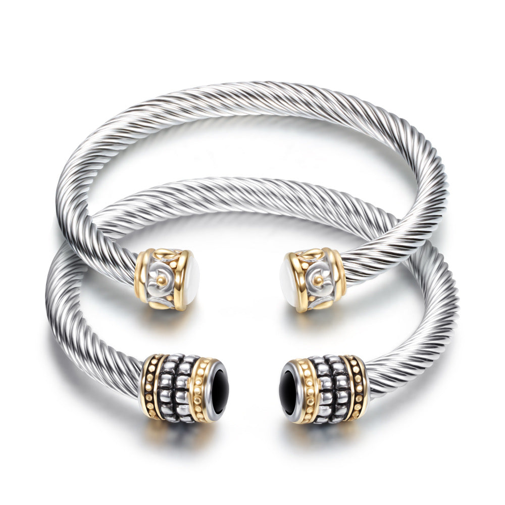 Damen Armreif mit drehbarem Drahtdesign und eleganten Zirkonia-Details Shop Nory