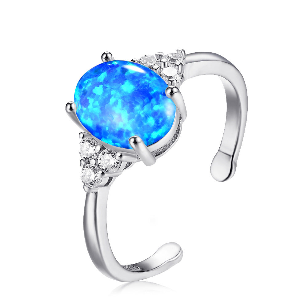 Damen Ring mit schimmerndem Opal und funkelnden Zirkonia-Details Shop Nory