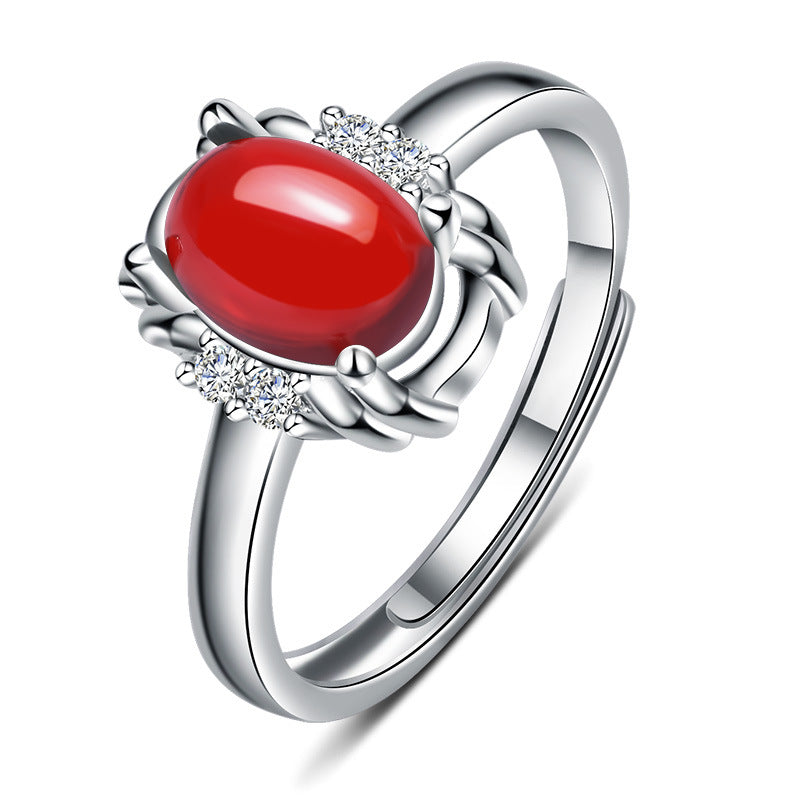 Damenring mit elegantem rotem Stein und funkelndem Zirkonia-Besatz Shop Nory