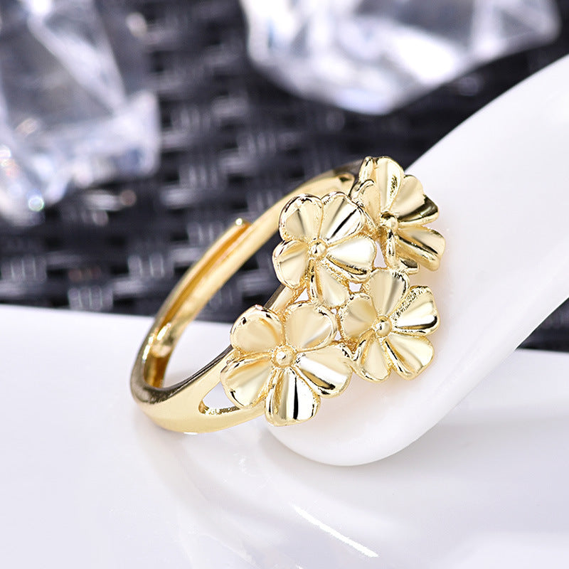 Damenring mit floralem Design und glänzenden Blüten Shop Nory
