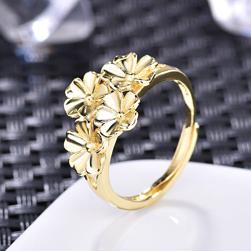 Damenring mit floralem Design und glänzenden Blüten Shop Nory