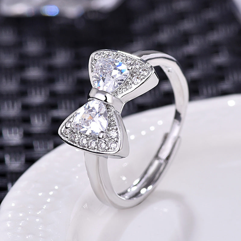 Damenring mit elegantem Schleifen-Design und funkelnden Zirkonia Shop Nory