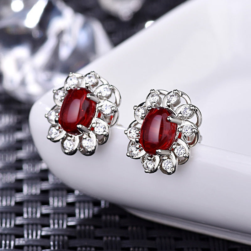 Damen Ohrstecker mit hochwertigem Jade-Element und funkelnden Zirkonia Shop Nory