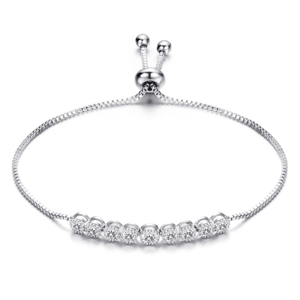 Damen Armband mit funkelnden Zirkonia-Steinen und verstellbarem Zugverschluss Shop Nory