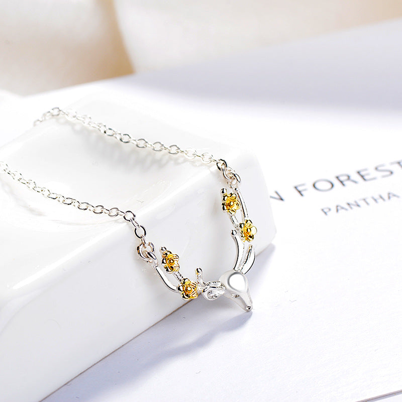 Damen Halskette mit kunstvollem Geweih-Design und floralen Akzenten Shop Nory