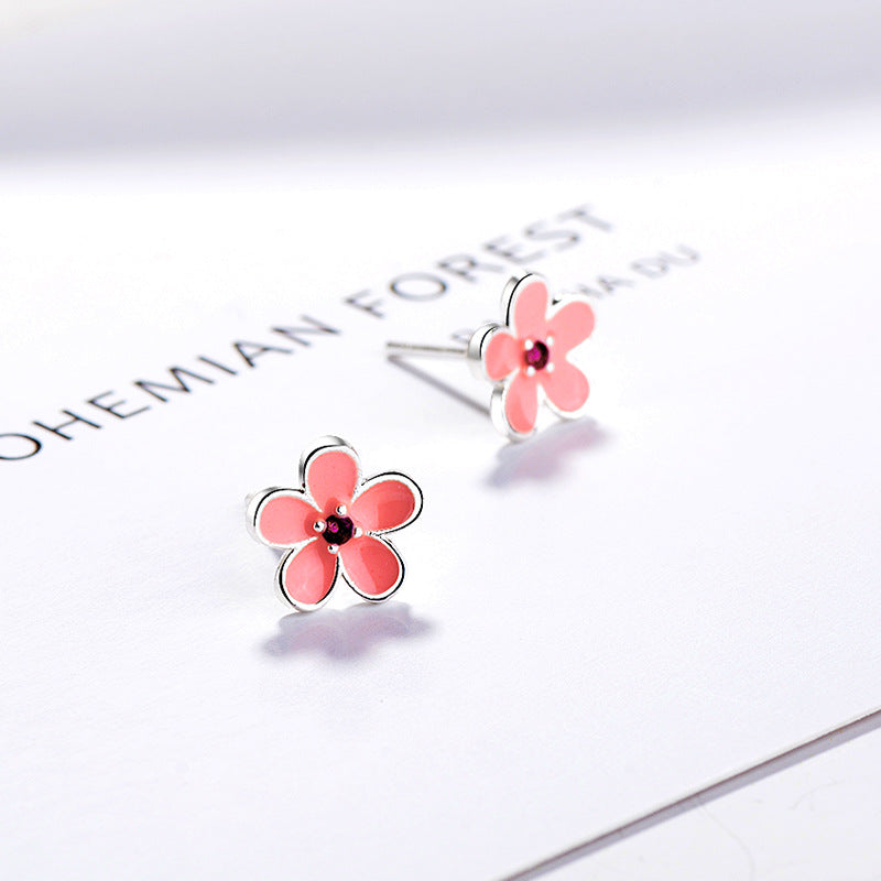 Damen Ohrstecker mit floralem Design und funkelnden Akzenten Shop Nory