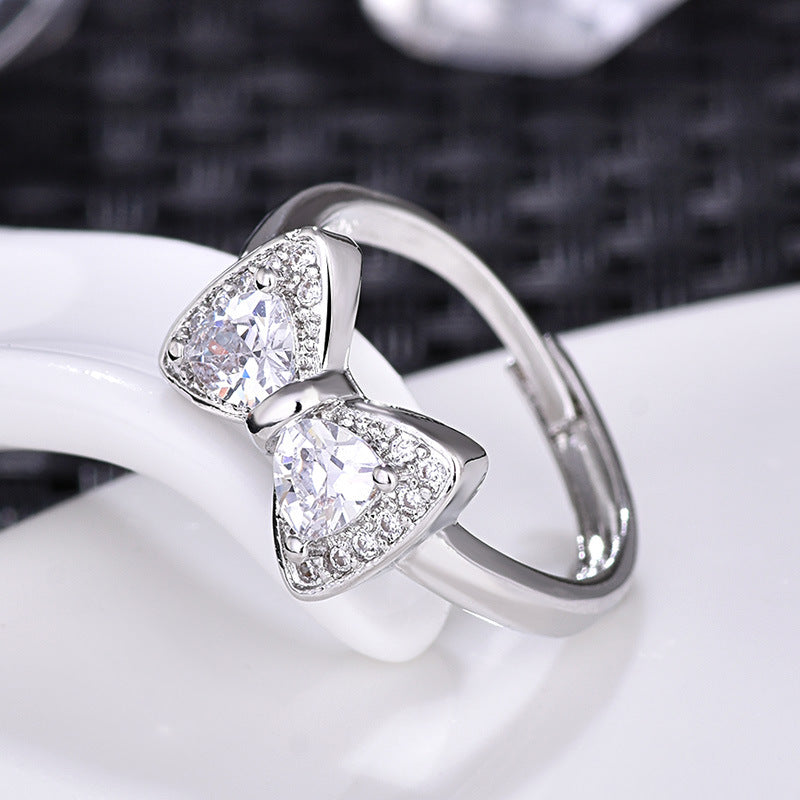 Damenring mit elegantem Schleifen-Design und funkelnden Zirkonia Shop Nory