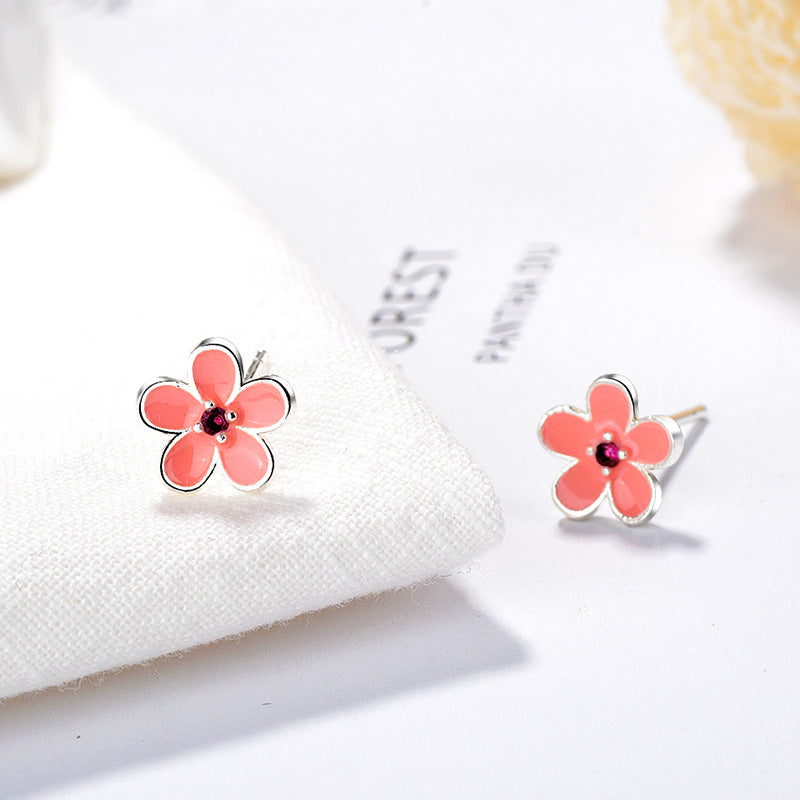 Damen Ohrstecker mit floralem Design und funkelnden Akzenten Shop Nory