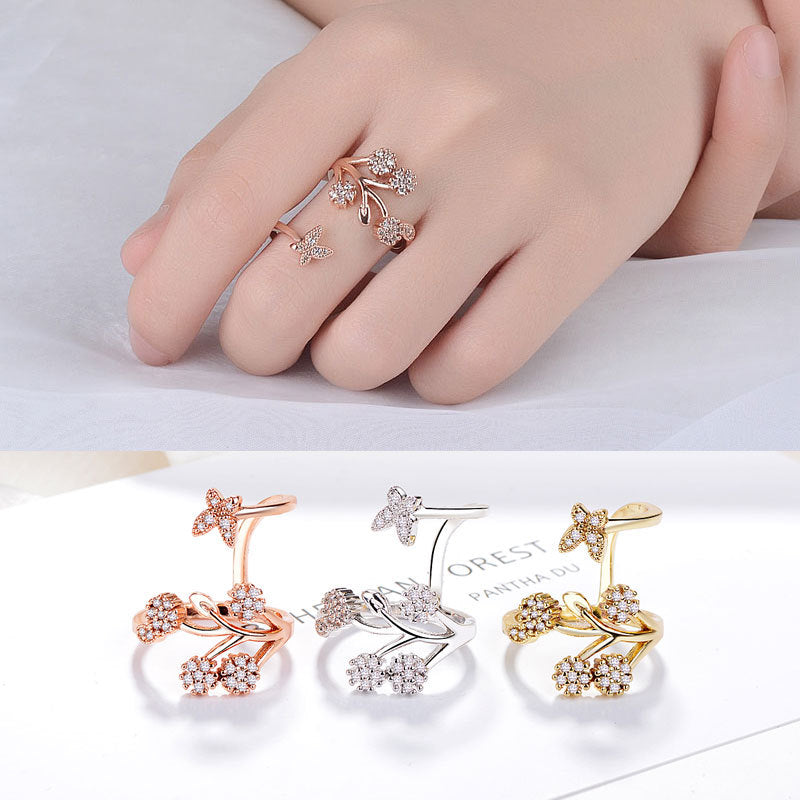 Damen Offener Ring mit floralem Design und funkelnden Zirkonia-Details Shop Nory