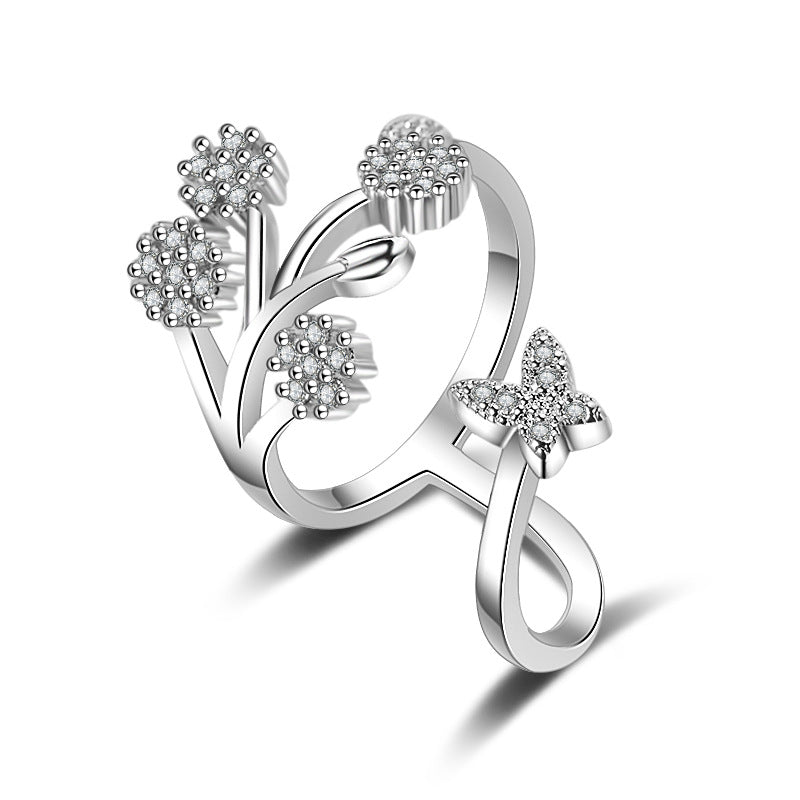 Damen Offener Ring mit floralem Design und funkelnden Zirkonia-Details Shop Nory
