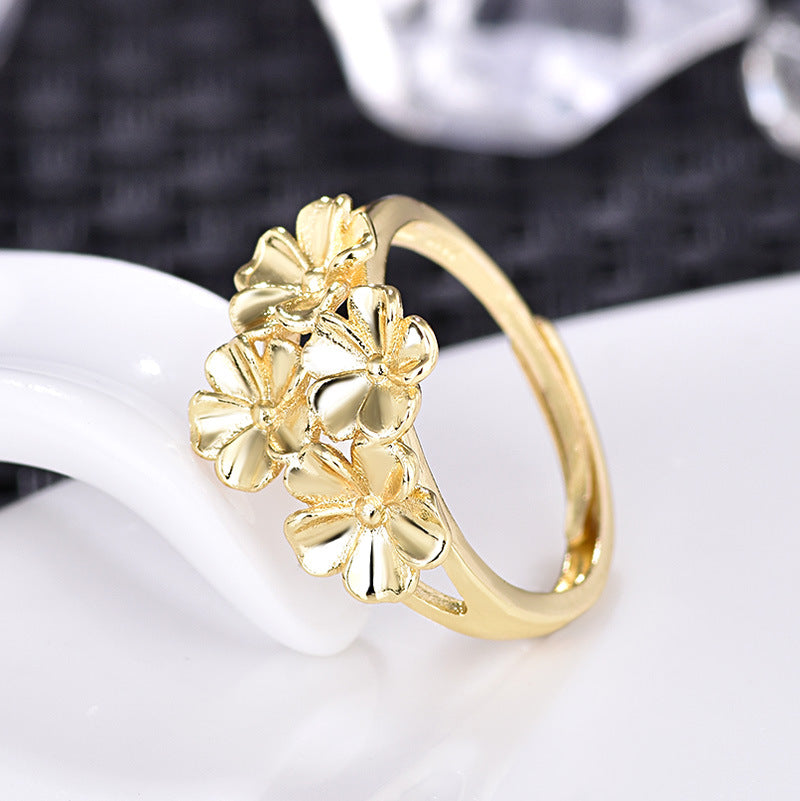 Damenring mit floralem Design und glänzenden Blüten Shop Nory