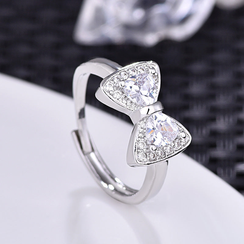 Damenring mit elegantem Schleifen-Design und funkelnden Zirkonia Shop Nory