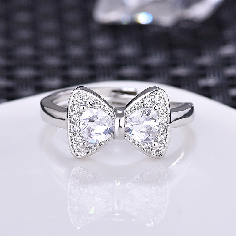 Damenring mit elegantem Schleifen-Design und funkelnden Zirkonia Shop Nory