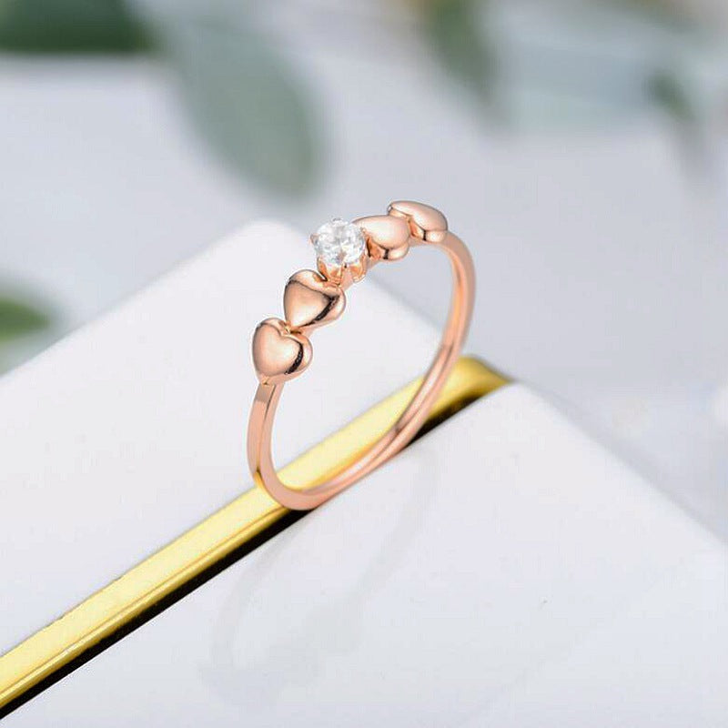 Damen Ring mit herzförmigen Akzenten und funkelndem Zirkonia Shop Nory