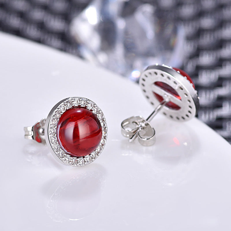 Damenohrringe mit leuchtendem jadegrünem Stein und glitzerndem Zirkonia-Rahmen Shop Nory