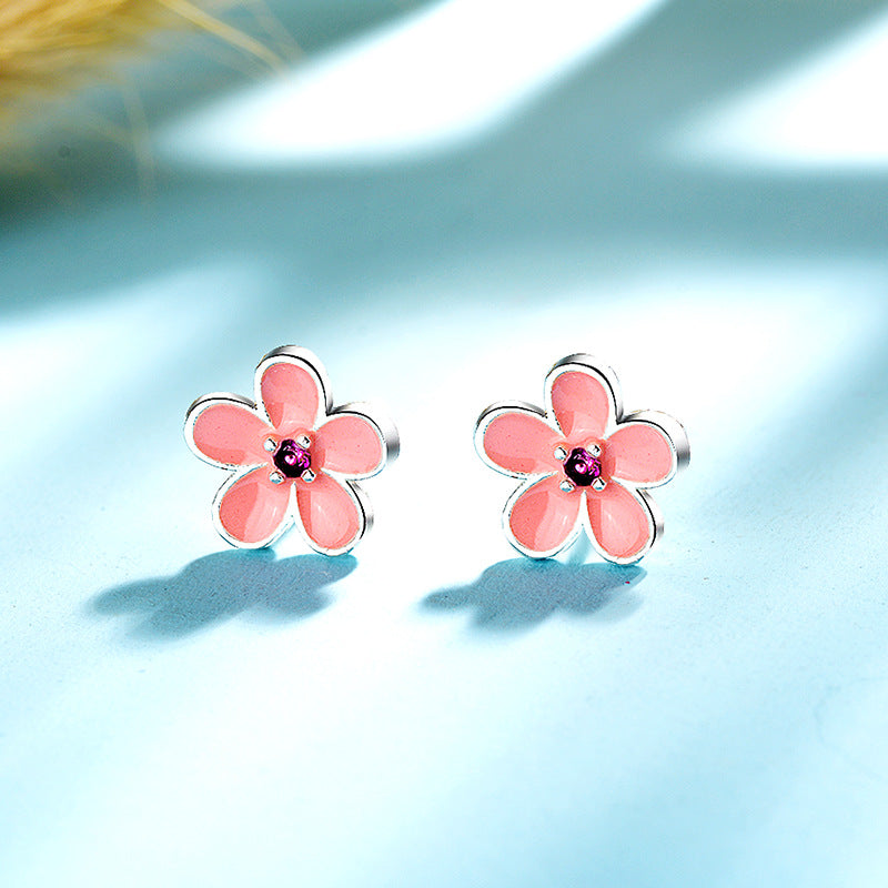 Damen Ohrstecker mit floralem Design und funkelnden Akzenten Shop Nory