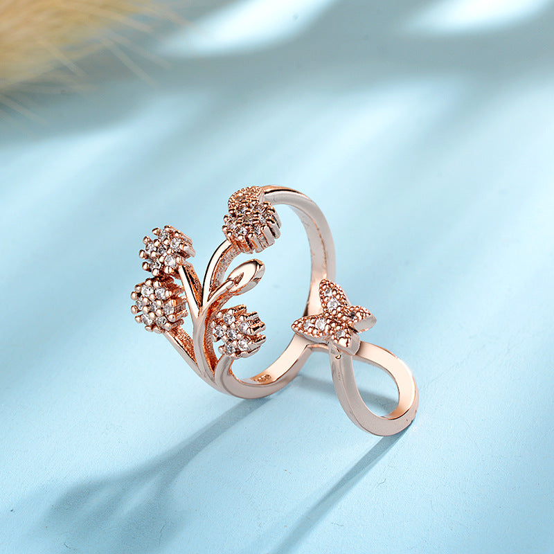 Damen Offener Ring mit floralem Design und funkelnden Zirkonia-Details Shop Nory