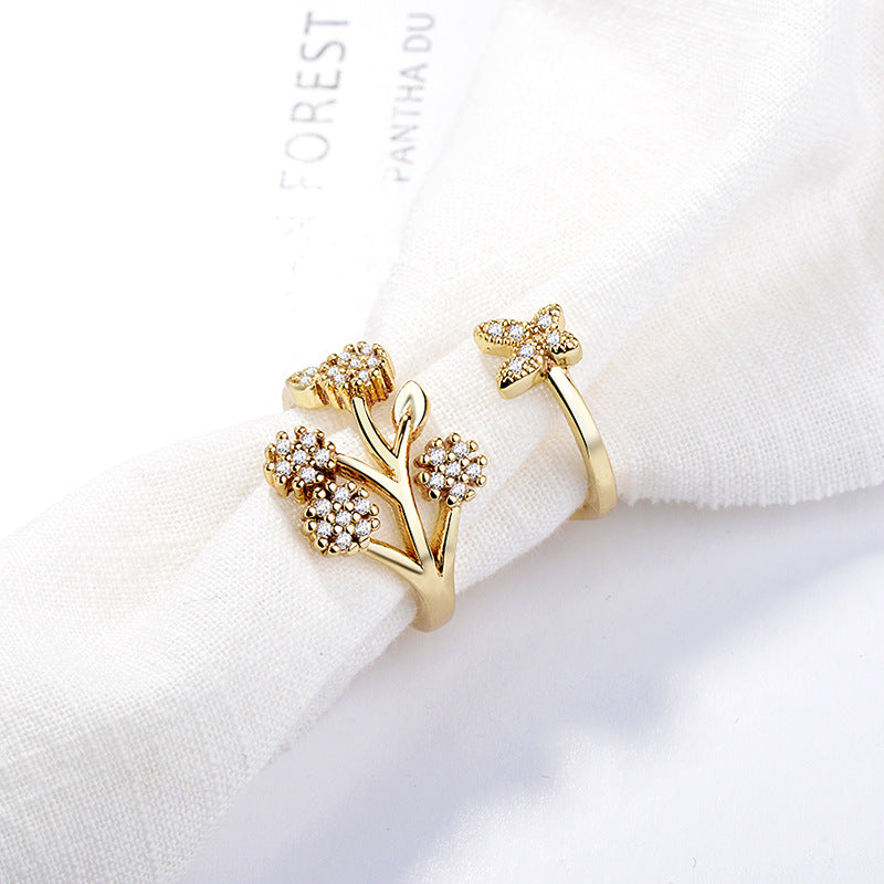 Damen Offener Ring mit floralem Design und funkelnden Zirkonia-Details Shop Nory