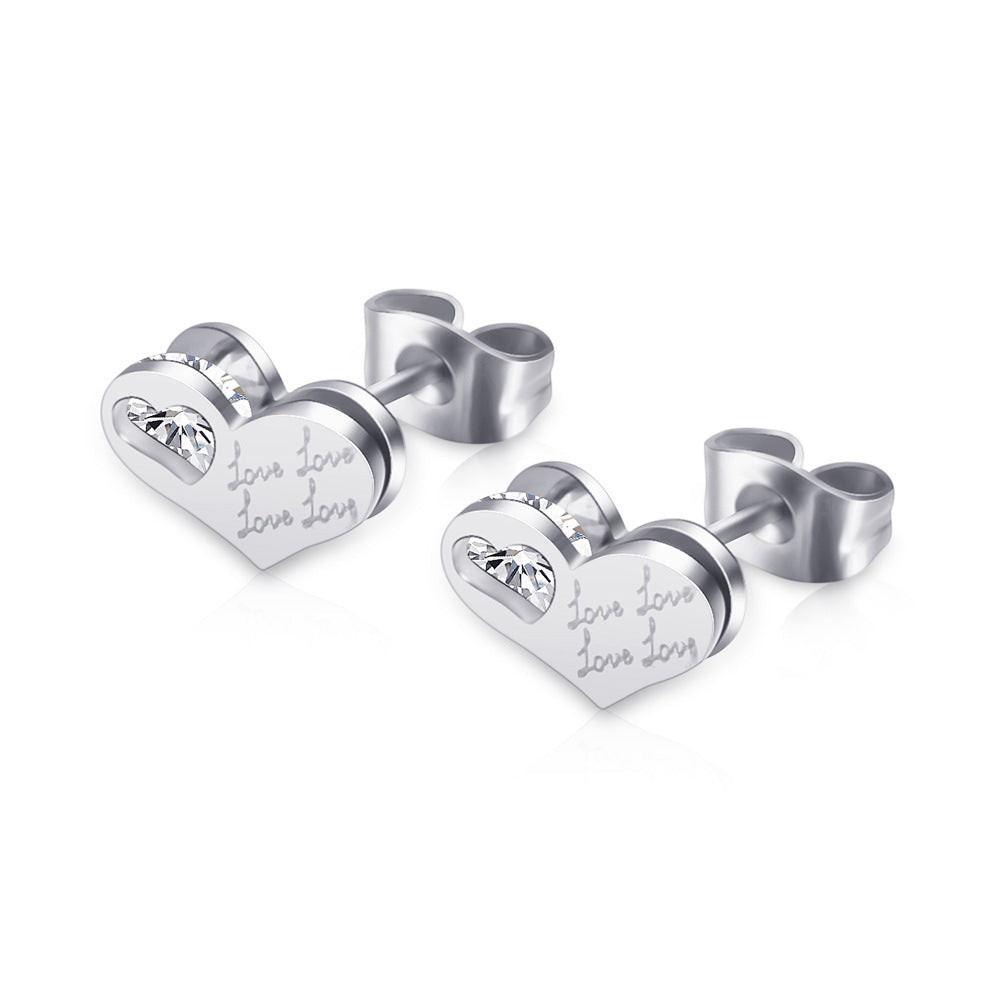 Damen Ohrstecker in Herzform mit funkelnden Kristallelementen Shop Nory