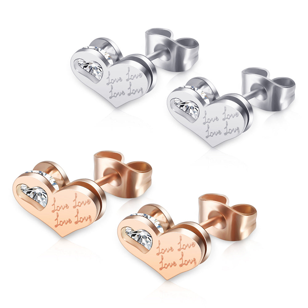 Damen Ohrstecker in Herzform mit funkelnden Kristallelementen Shop Nory