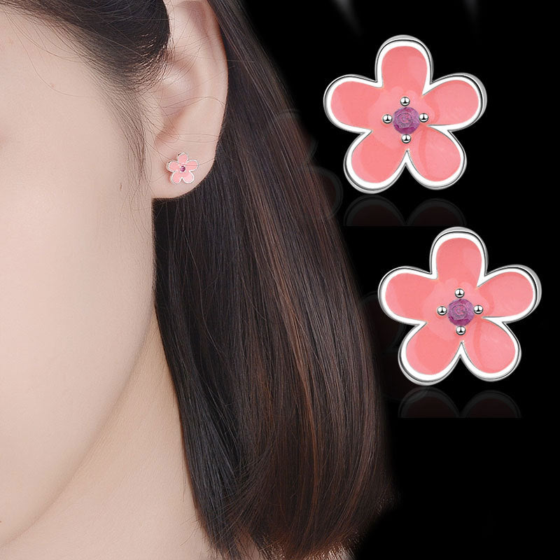 Damen Ohrstecker mit floralem Design und funkelnden Akzenten Shop Nory