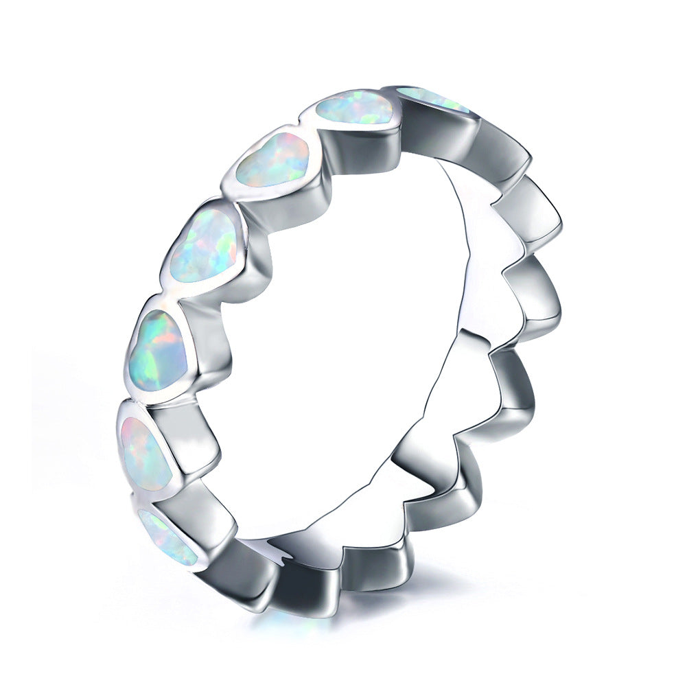Damen Ring mit schillernden Opalsteinen und eleganter Edelstahlfassung Shop Nory